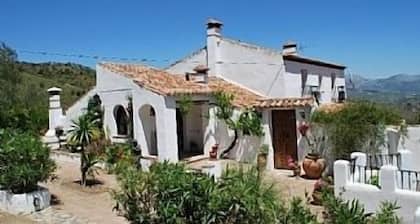 Large Andalucian Farmhouse, stunning views, pool & gardens,close to Natural Park