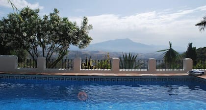 Large Andalucian Farmhouse, stunning views, pool & gardens,close to Natural Park