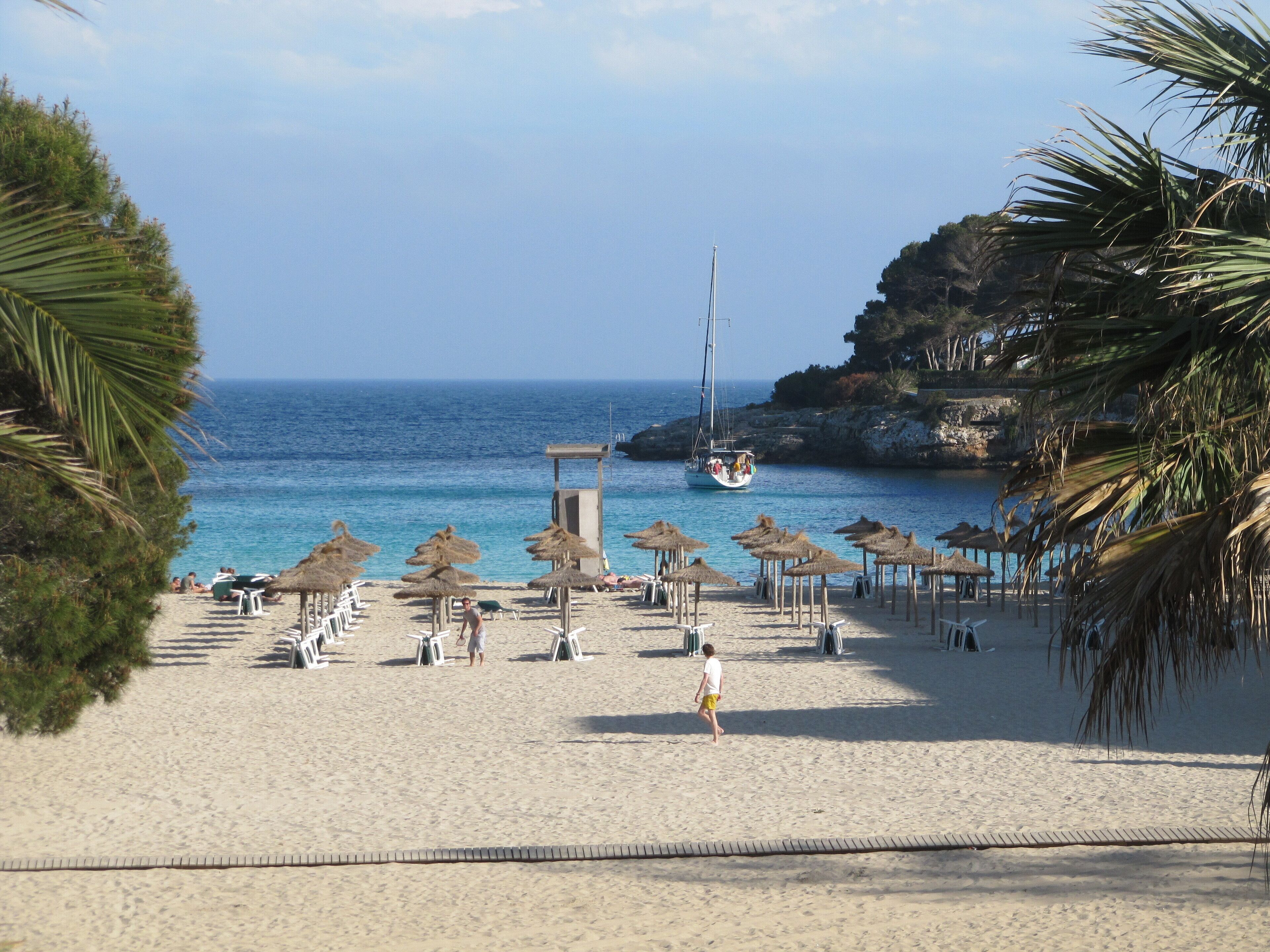 On the beach, sun-loungers