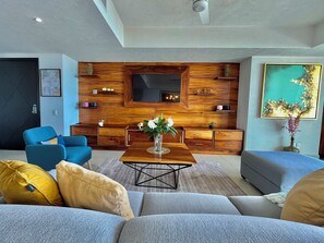 Téléviseur connecté, table de ping-pong, livres