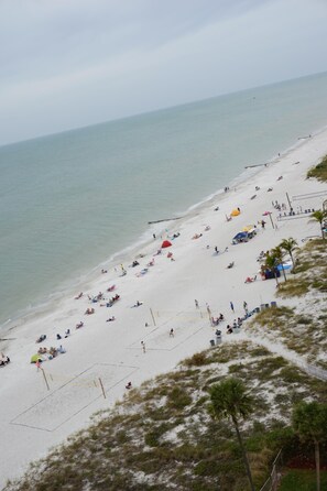 On the beach, sun-loungers, beach towels
