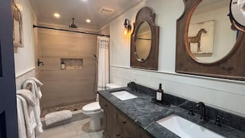 Combined shower/tub, hair dryer, towels, soap