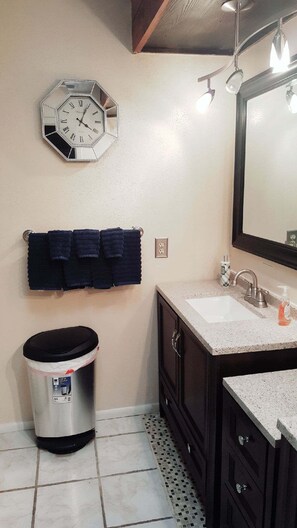 Hair dryer, towels, soap, shampoo