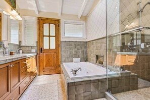 Bathtub, hair dryer, bidet, towels