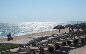On the beach, beach towels