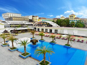 2 outdoor pools, open 7 AM to 9 PM, pool umbrellas, sun loungers