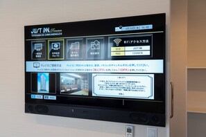 A digital display of a hotel room's amenities and services, including a TV, WiFi access, and a map of the hotel. - Just Inn Premium Toyohashi Station Shinkansen Guchi (Toyohashi)
