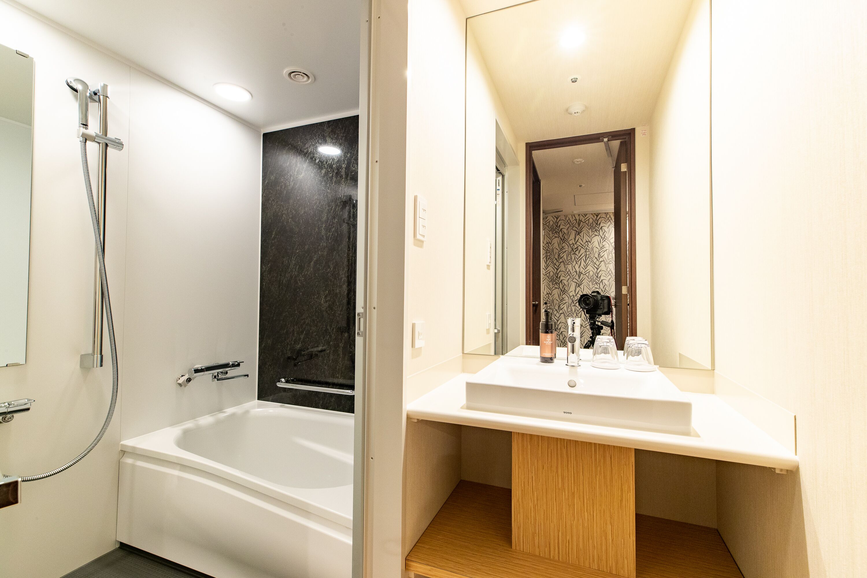 economy twin room, non smoking (no desk) | bathroom | combined shower/bathtub, free toiletries, hair dryer, slippers
