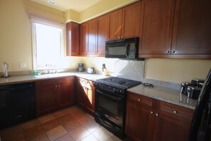 Kitchen opens into main room.