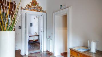 Triple Room, Shared Bathroom | 1 bedroom, blackout drapes, free cribs/infant beds, free WiFi