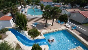 Indoor pool, seasonal outdoor pool, pool umbrellas, pool loungers