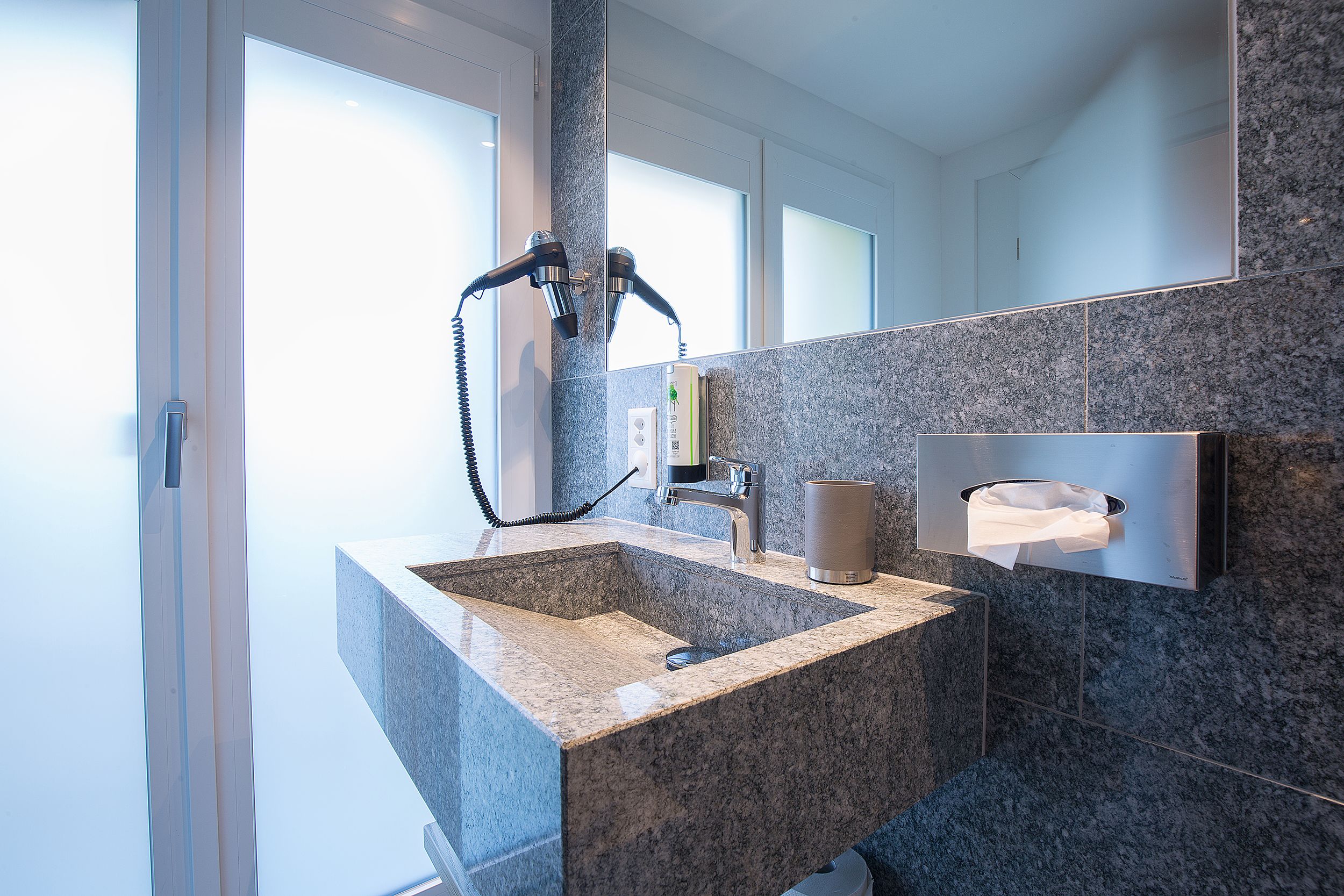 junior suite | bathroom amenities | shower, free toiletries, hair dryer, towels