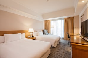 Deluxe vierpersoonskamer | 1 slaapkamer, luxe beddengoed, donsdekens, een kluis op de kamer