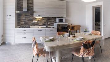 Apartment, 1 Bedroom, Sea View | Private kitchen | Full-size fridge, microwave, oven, stovetop
