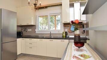 Villa, Sea View | Private kitchen | Full-sized fridge, microwave, oven, stovetop