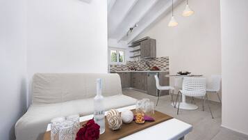 Deluxe Room, Balcony, Sea View | Living area | TV