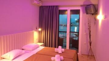 Basic Twin Room, 1 Bedroom, Balcony, Beach View | In-room safe, free WiFi, bed sheets