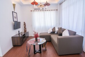 Appartement, 1 chambre | Coin séjour