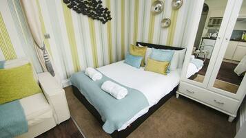 1 bedroom, laptop workspace, iron/ironing board, bed sheets