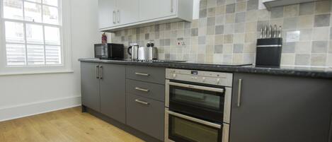 Apartment | Private kitchen | Microwave, oven, stovetop, dishwasher