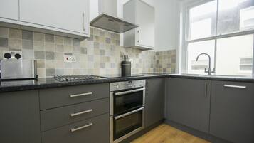 Apartment | Private kitchen | Microwave, oven, stovetop, dishwasher