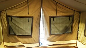 A tent with two windows and a central door. - Red Rocks Campsite & Guesthouse (Muko)