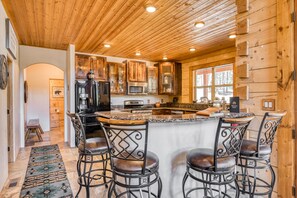 Fridge, microwave, oven, stovetop - Secluded log home with mountain & forest views deck - one mile to lifts (Angel Fire)