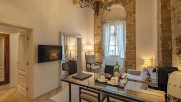 Deluxe Suite, 1 Bedroom (Botticelli) | Living area | 65-inch flat-screen TV with satellite channels, TV, heated floors