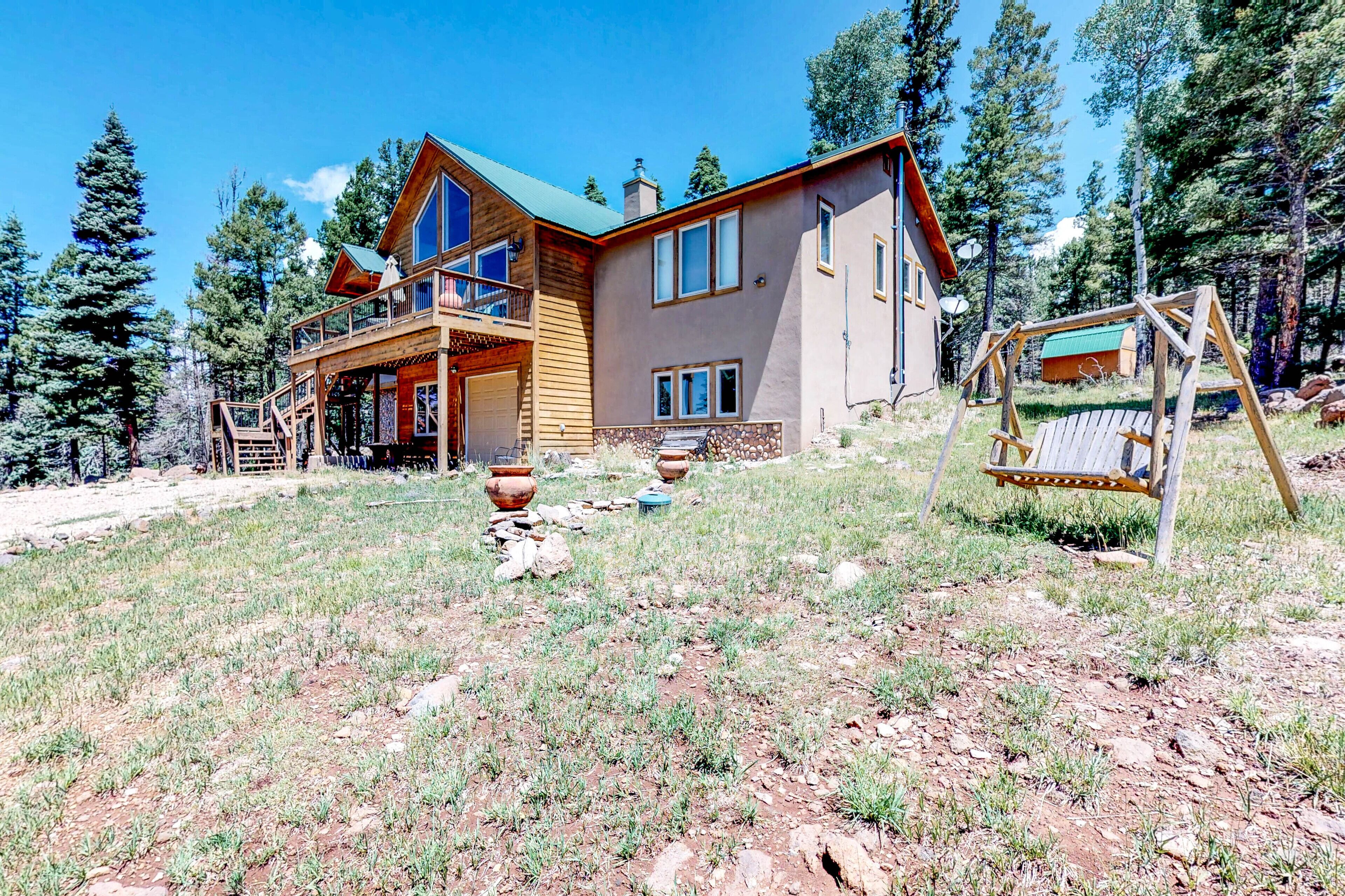 Hike, golf, fish & ski from this lodge with hot tub, foosball table & views
