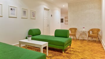 Desk, laptop workspace, blackout curtains, iron/ironing board