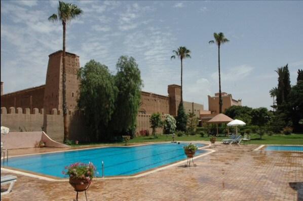 Outdoor pool, pool umbrellas, pool loungers