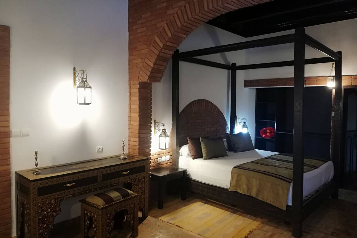 Desk, blackout curtains, bed sheets