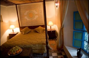 Desk, blackout curtains, bed sheets