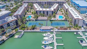Exterior - Waterfront 1BR condo in Marco Island with pool, marina access, Wi-Fi, and kitchen. (Marco Island)