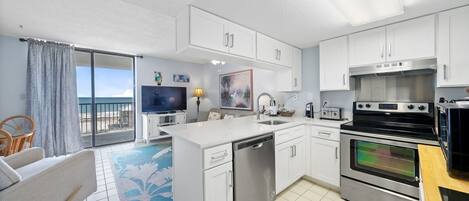 Coffee/tea maker, fridge, microwave, oven