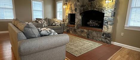 Smart TV, fireplace, DVD player, books