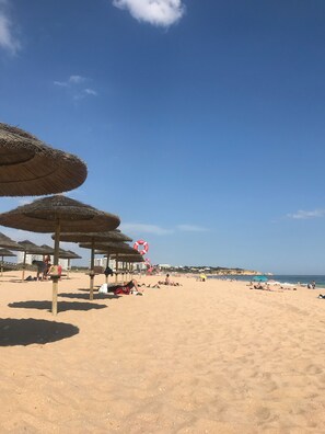 On the beach, beach towels