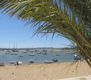 On the beach, beach towels