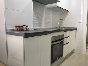 Fridge, microwave, oven, coffee/tea maker