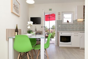 Standard Apartment | Living area | Flat-screen TV - Apartments Viki (Trogir)