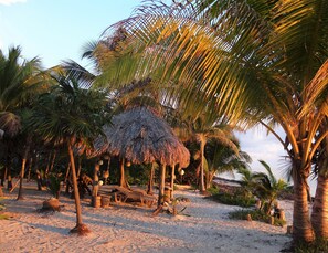 On the beach, sun-loungers, beach towels