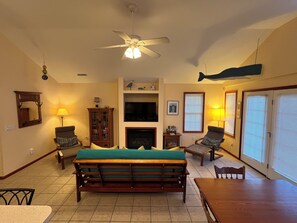 Smart TV, fireplace, DVD player, books