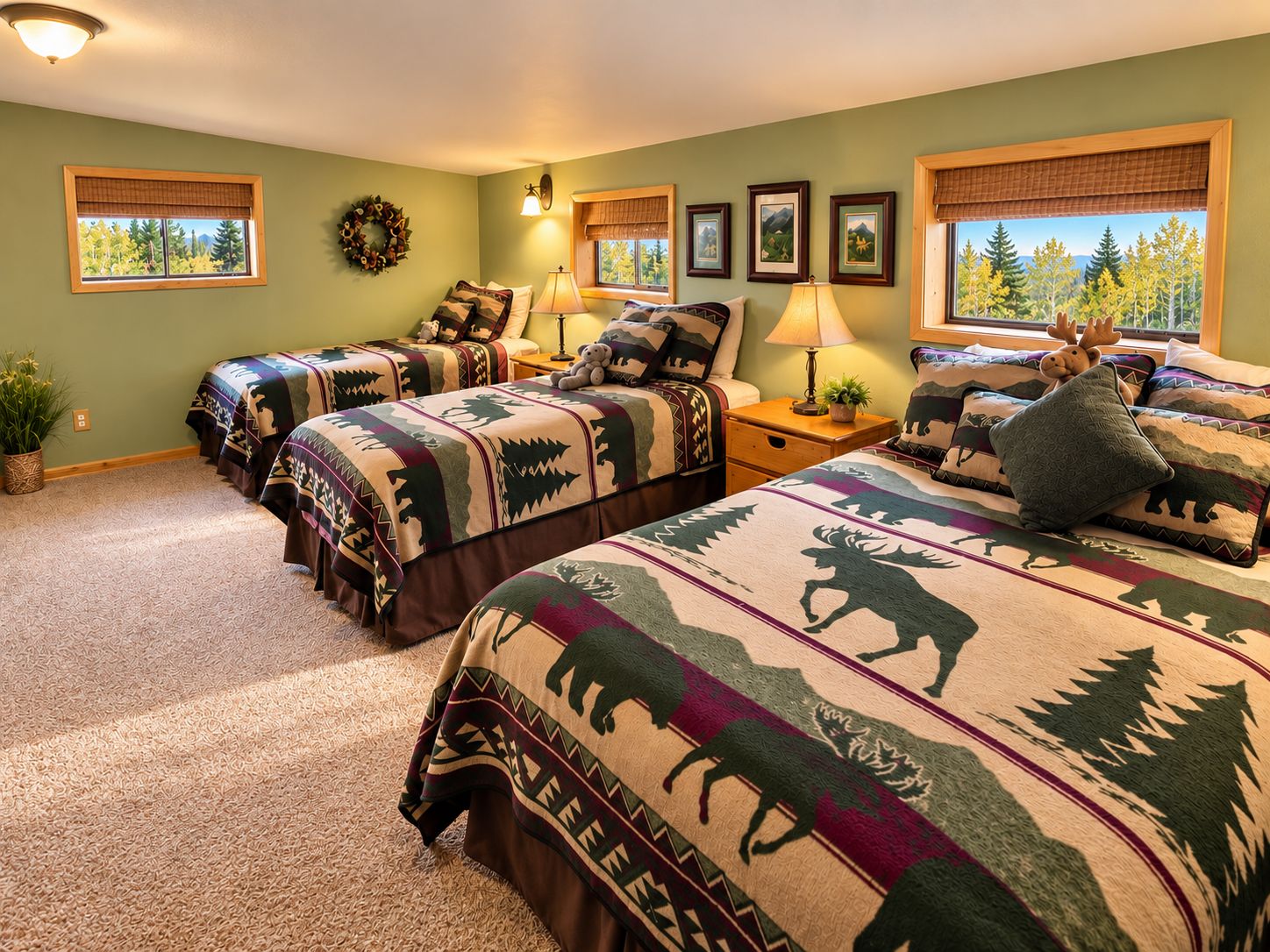 A room with two beds, a nightstand, a lamp, a wall clock, and a window with a view of trees.