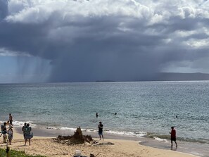 On the beach, sun-loungers - Beachfront 1-bedroom corner condo on Kameole Beach II, with two ocean views. (Kihei)