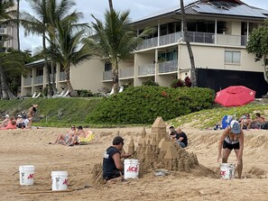 On the beach, sun-loungers