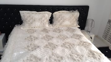 1 bedroom, premium bedding, blackout curtains, iron/ironing board