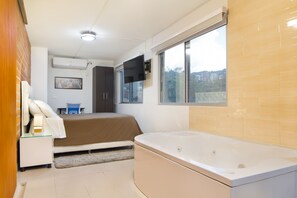 Comfort Apartment, 1 Queen Bed, Non Smoking | In-room safe, individually furnished, desk, iron/ironing board