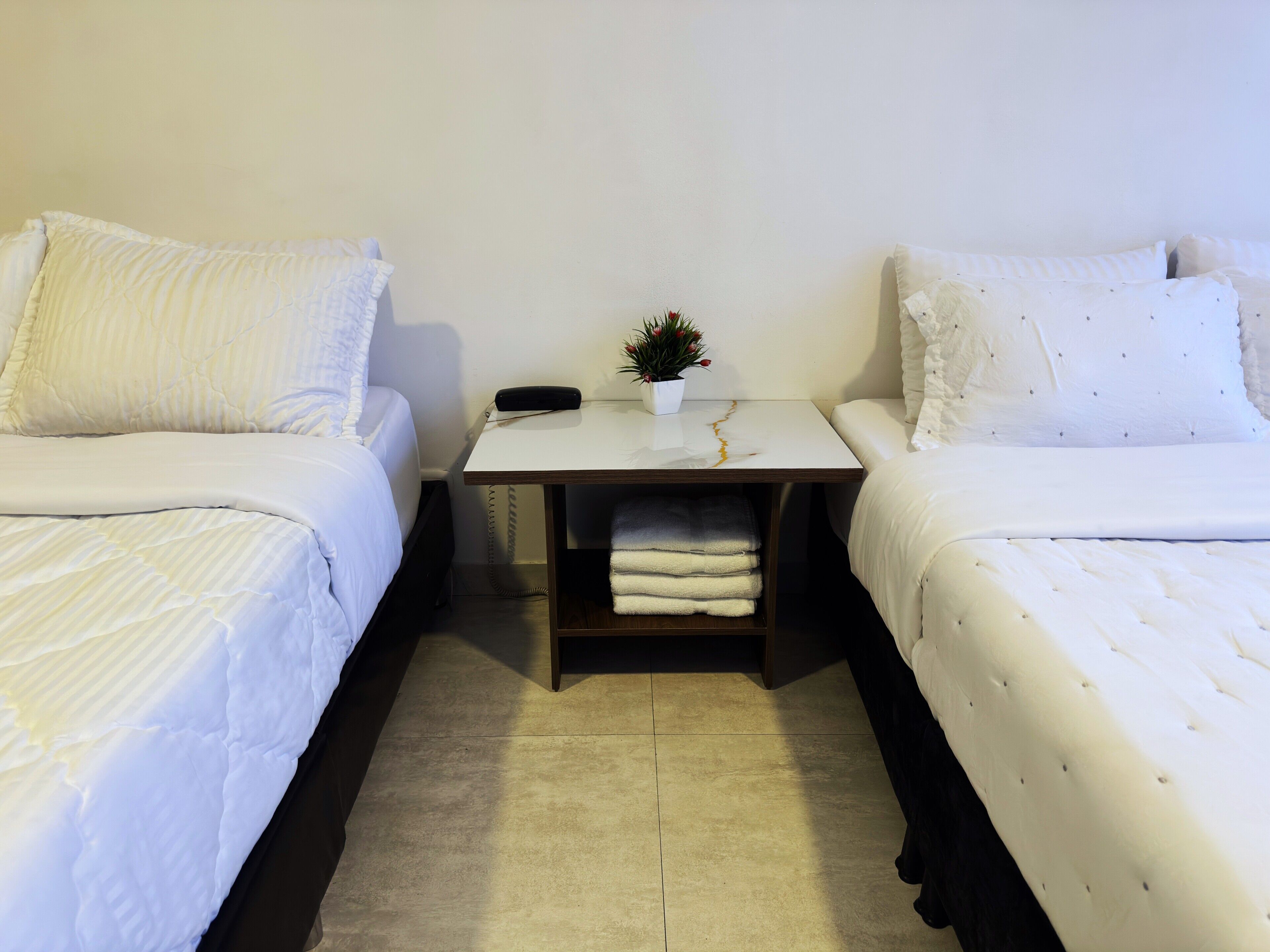 Deluxe Quadruple Room | Egyptian cotton sheets, premium bedding, down comforters, pillowtop beds