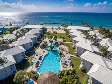 Outdoor pool. BE WHERE THE CRUISE SHIP CROWDS CAN'T GO! Oceanfront resort on Seven Mile Beach