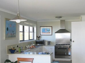 Fridge, microwave, oven, stovetop - High On Penguin - located at Penguin (Penguin)